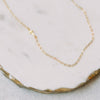 The Tiny Cross Necklace